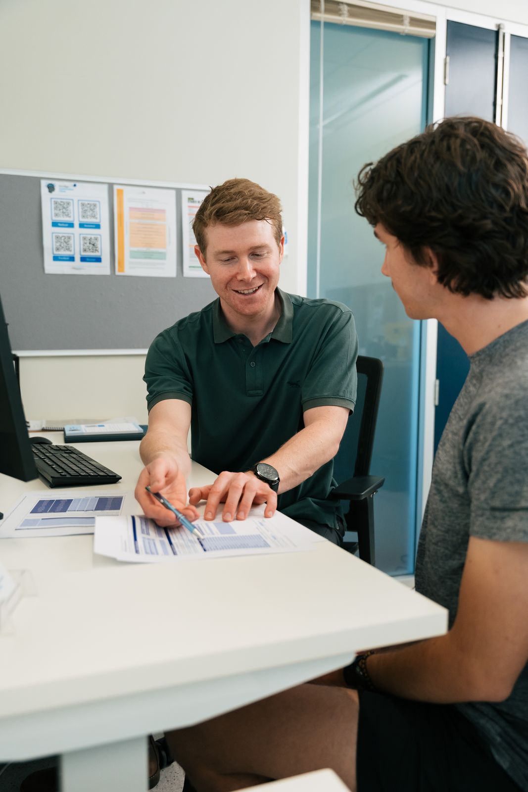 Physiotherapist discussing assessment results with a patient